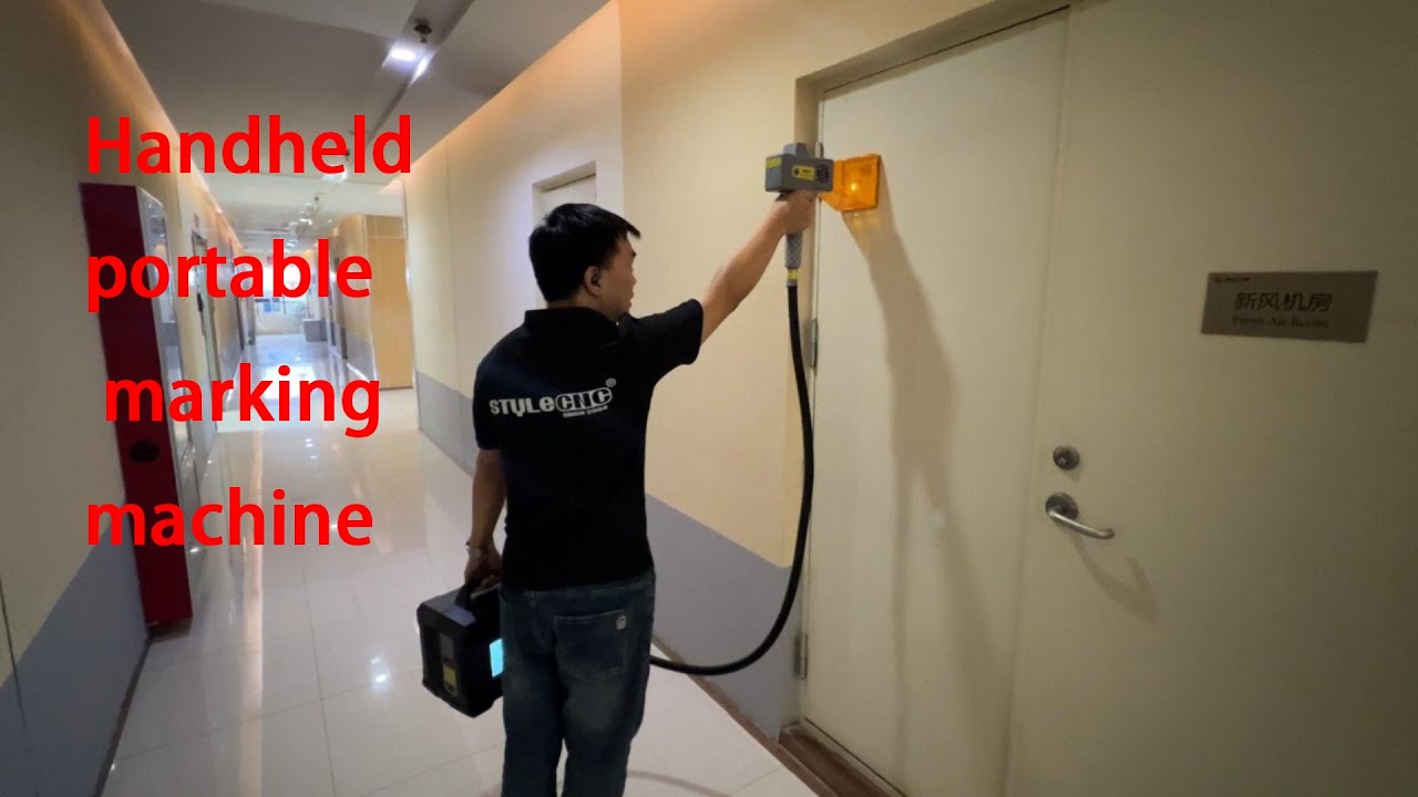 電池供電的便攜式手持光纖激光雕刻機(jī) 電池供電的便攜式手持光纖激光雕刻機(jī)